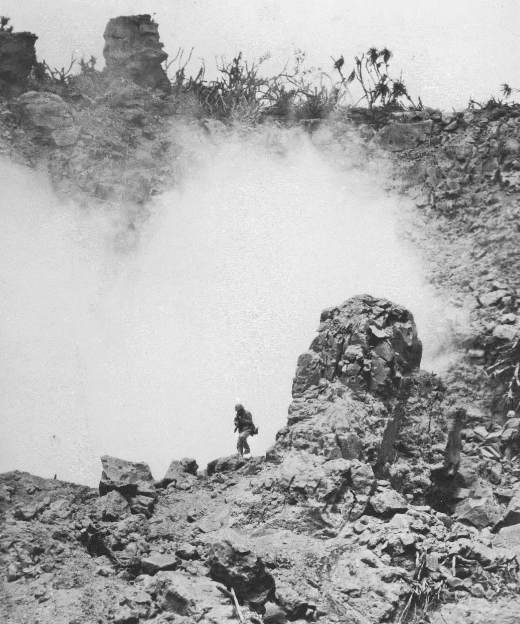 Lone US Marine in rocky terrain, Iwo Jima, Japan, Feb 1945
