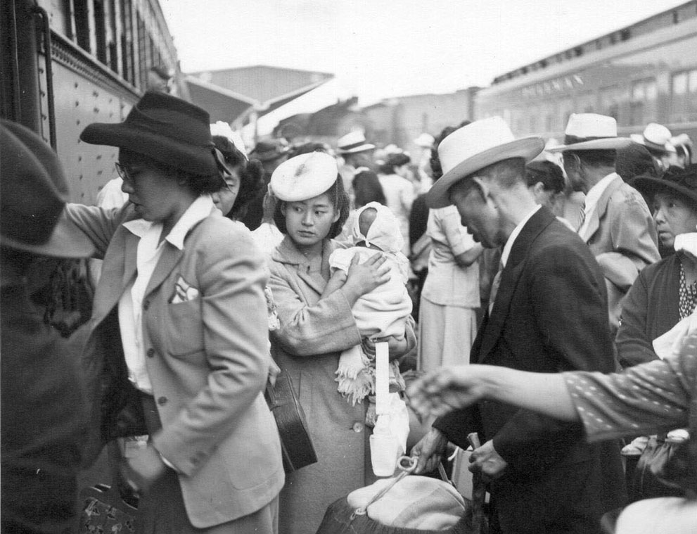 Japanese-Americans returning to Sacramento, California, United States after being released from Rohwer Center internment camp in McGehee, Arkansas, United States, 30 Jul 1945