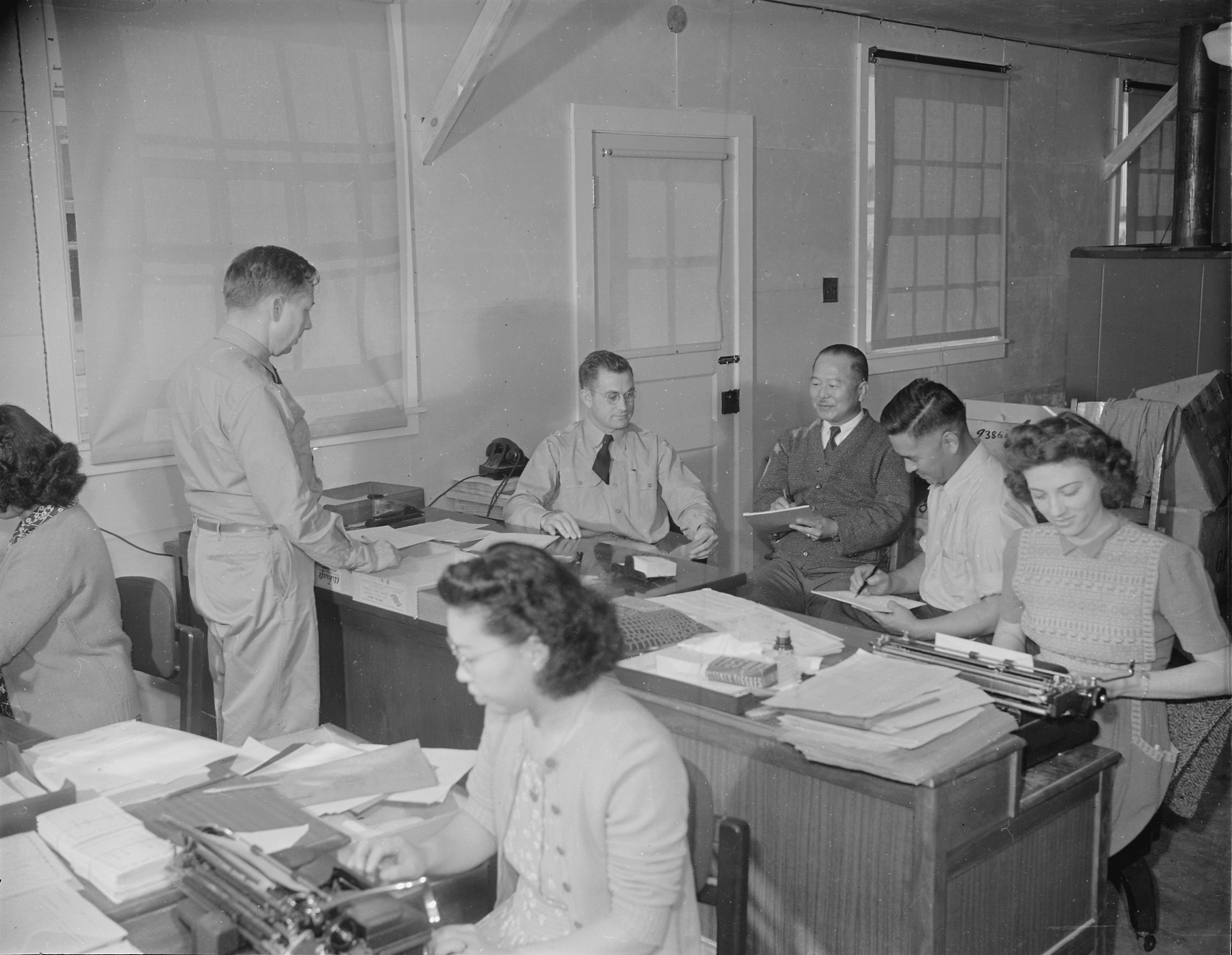 D. J. Hudson, Steward, R. R. Richmond, and other workers of the Mess Section of Jerome War Relocation Center, Arkansas, United States, 19 Nov 1942