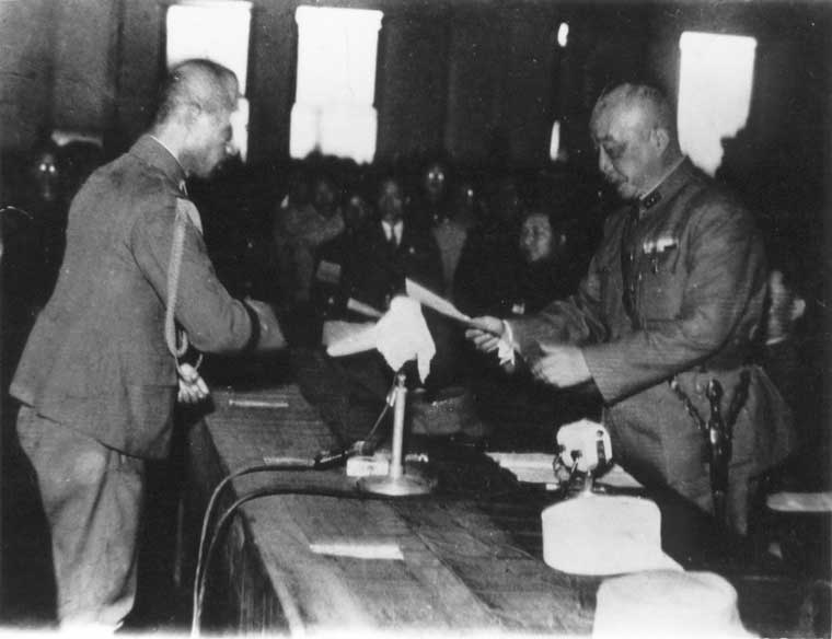 Chen Yi accepting surrender from Rikichi Ando, Taipei City Hall, Taiwan, 25 Oct 1945