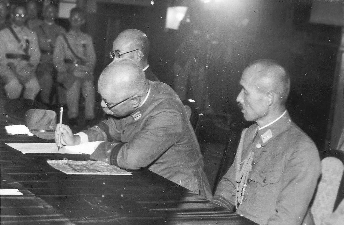 Rikichi Ando signing the surrender document, Taipei City Hall, Taiwan, 25 Oct 1945