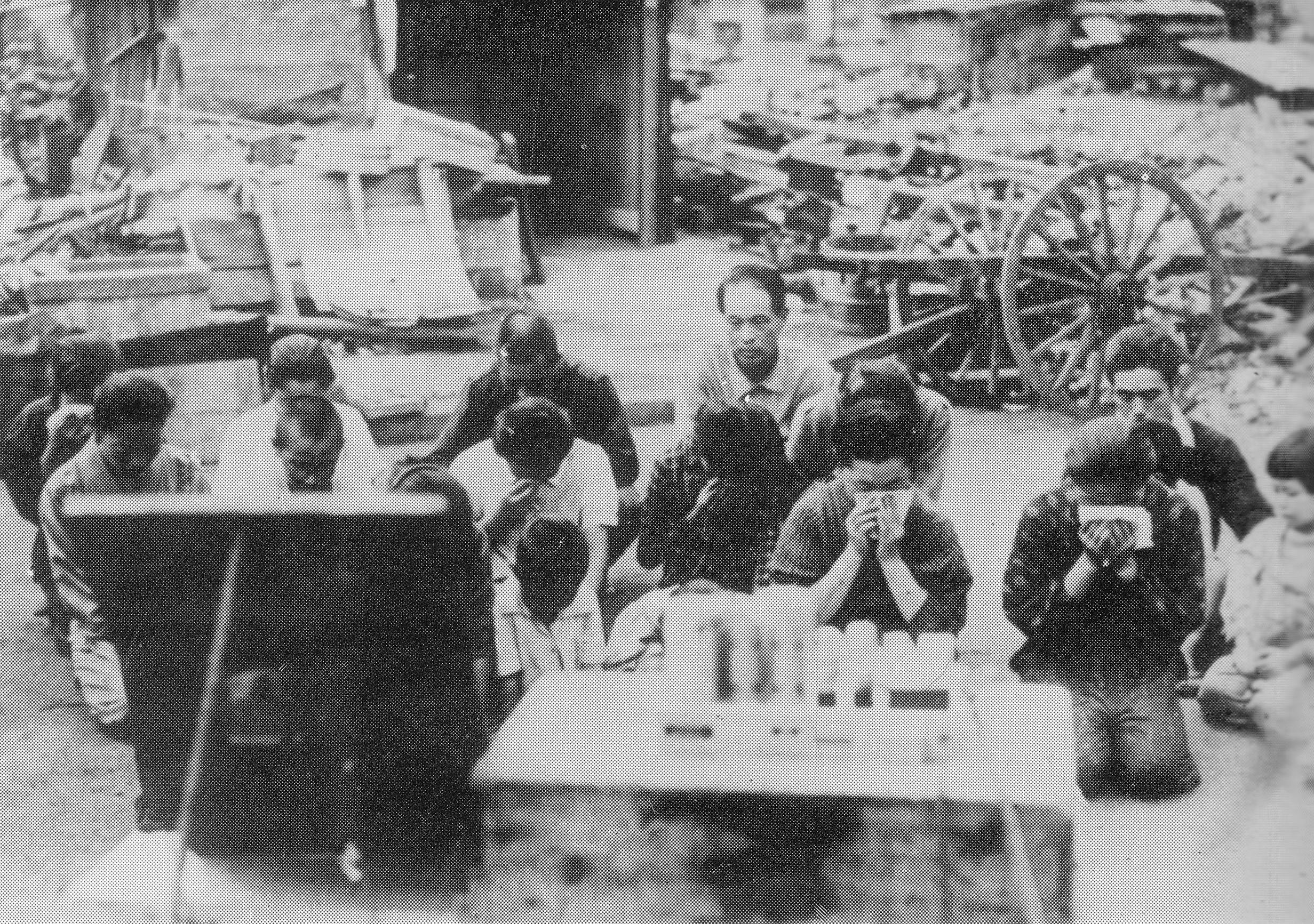 Japanese civilians listening to the Imperial Rescript of Surrender, 15 Aug 1945