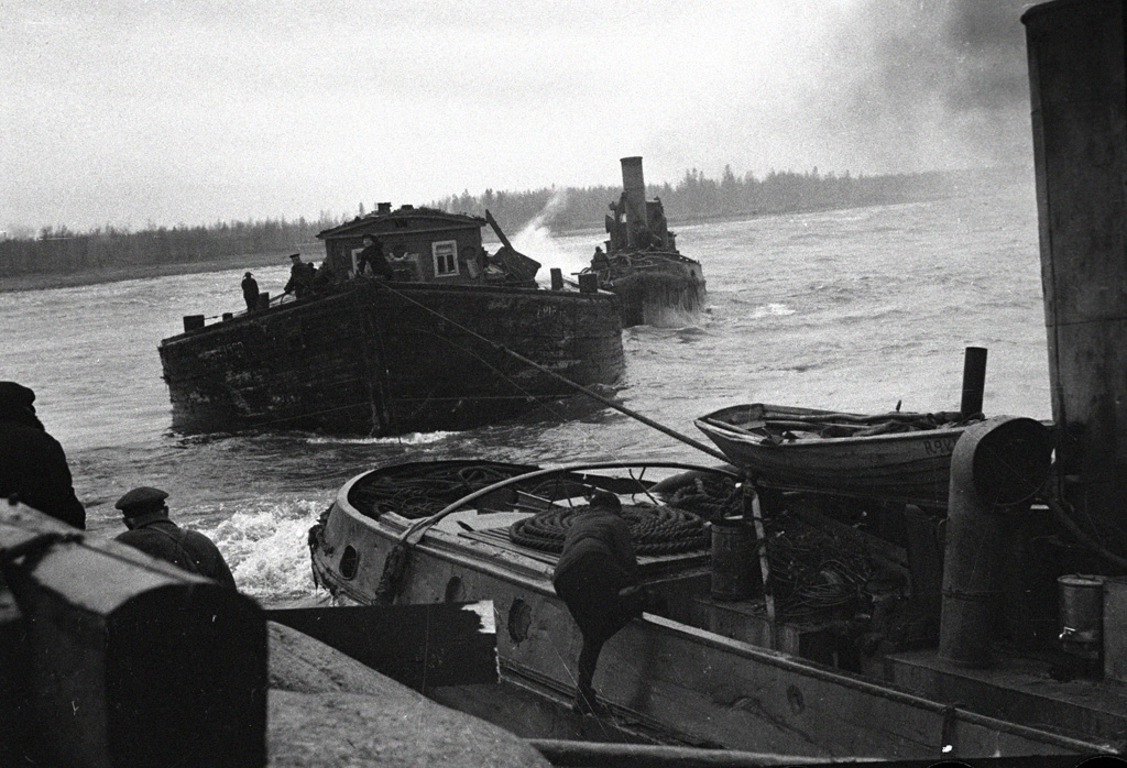 Boats arriving at Leningrad, Russia via Lake Ladoga, bringing food and other supplies, 1 Sep 1942