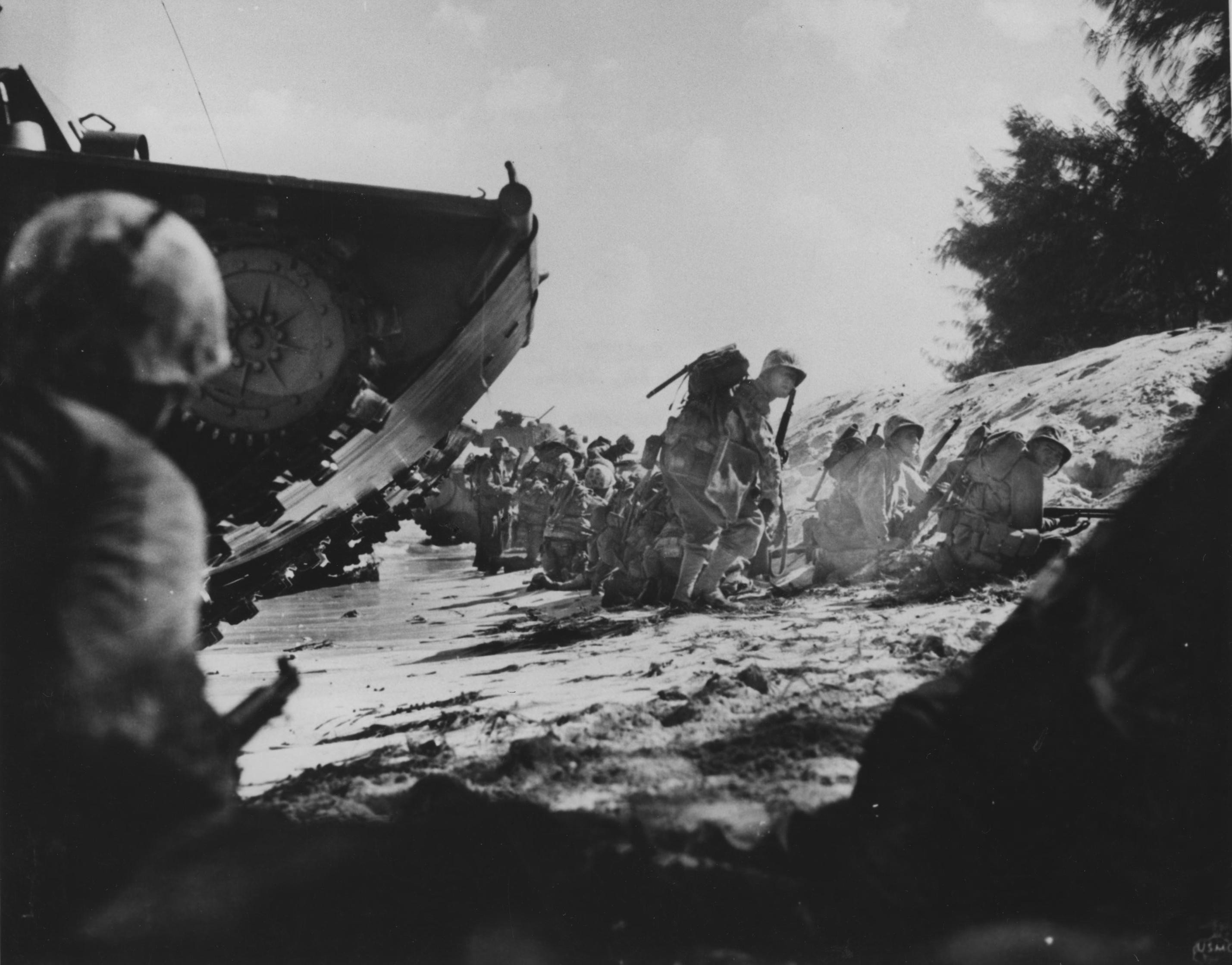 Men of the first wave of US Marines to land on Saipan, Mariana Islands, 15 Jun 1944