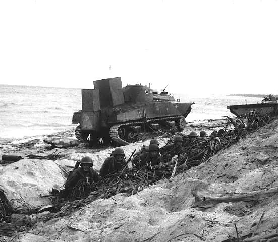 US Army troops waiting on the invasion beach on Kwajalein, 1 Feb 1944