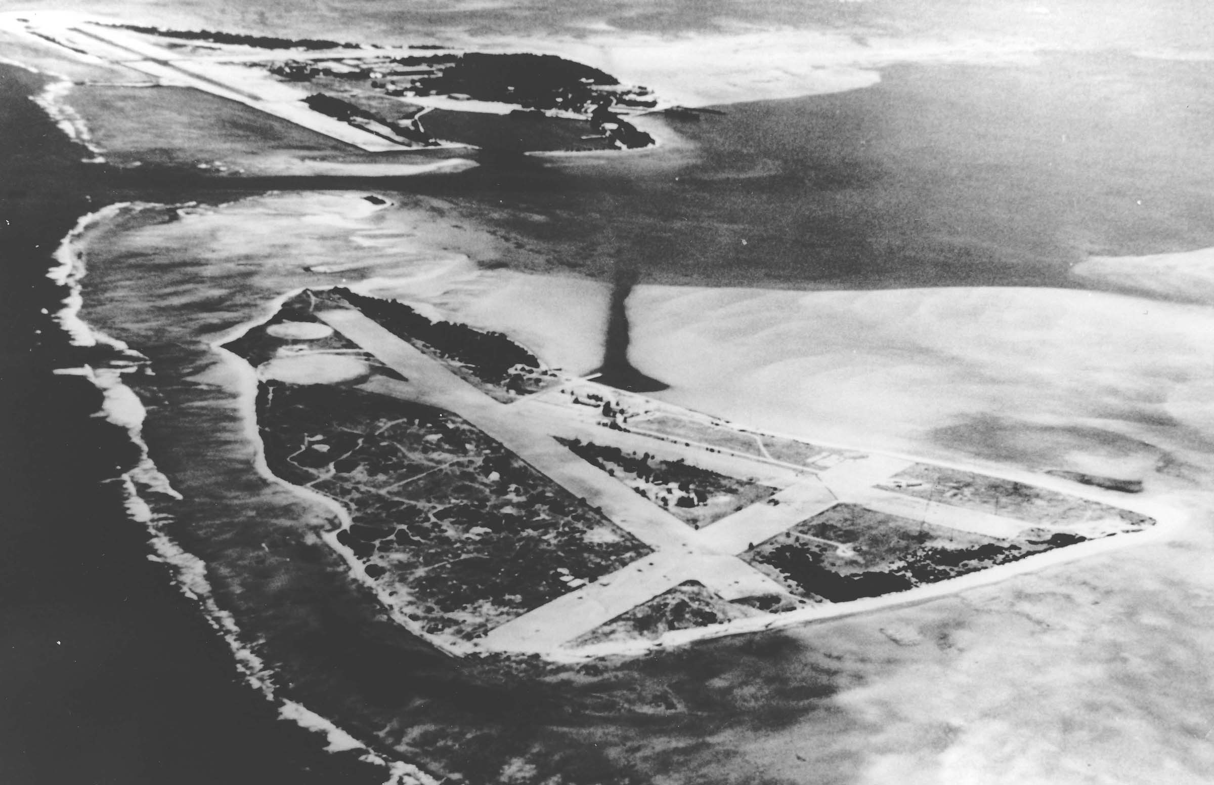 Aerial view of the Midway Islands and the Naval Air Station, Jun 1942 (later renamed Henderson Field). Interestingly, the air station is two different runway complexes on two different islands, but it still considered one air station.