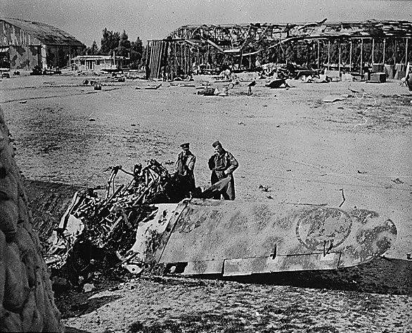 Wreckage of Italian hangars and aircraft, Castel Benito airfield outside Tripoli, Libya, late 1942