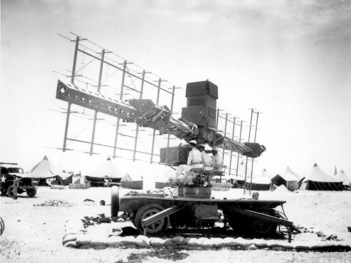 Three soldiers manning US Army 90th Coast Artillery's radar, Casablanca, French Morocco, 19 Jun 1943; note the three men were African-American