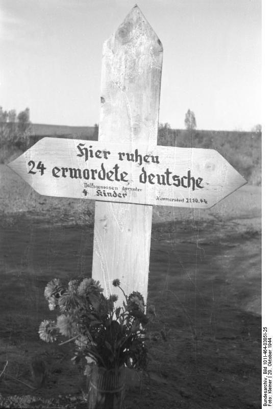 Grave marker for 24 German civilians killed by Soviets, Nemmersdorf, East Prussia, Germany, late Oct 1944, photo 2 of 3