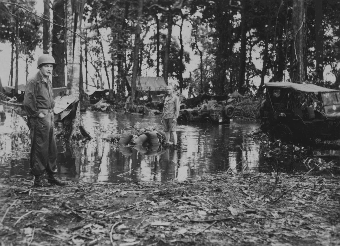 General Lemuel Shepherd at a wet camp site, Cape Gloucester, New Britain, Australian New Guinea, 1944