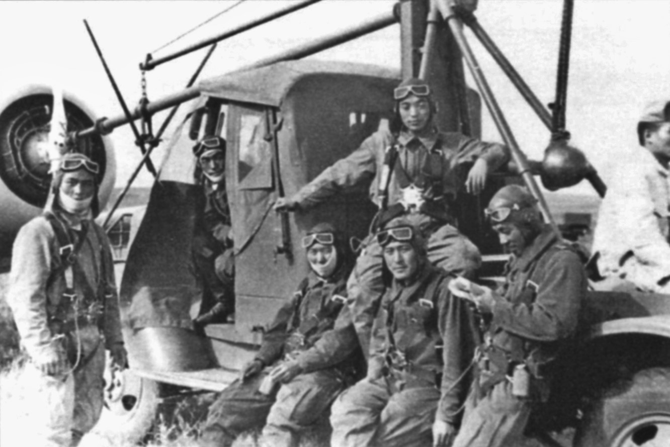 Japanese Army pilots taking a break during the Nomonhan Incident, Mongolia Area, China, Aug 1939; note Toyota KC truck
