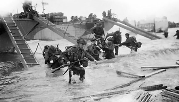 Royal Marine Commandos of Headquarters, 4th Special Service Brigade, British 2nd Army landing at Juno 'Nan Red' Beach from LCI(S) landing craft, Normandy, France, 6 Jun 1944