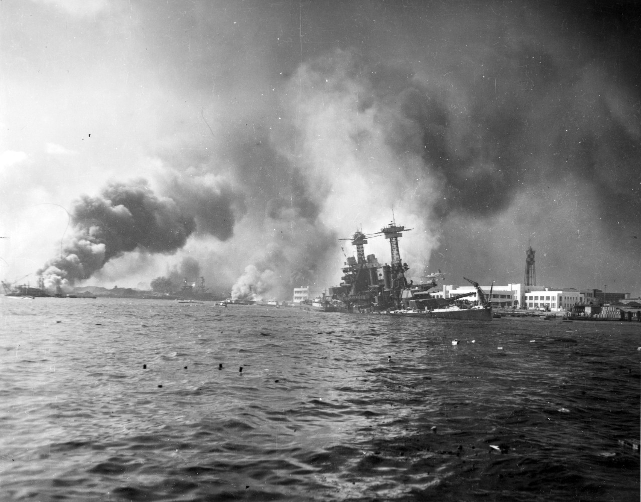 Stern view of USS California listing to port, Pearl Harbor, Oahu, US Territory of Hawaii, 7 Dec 1941