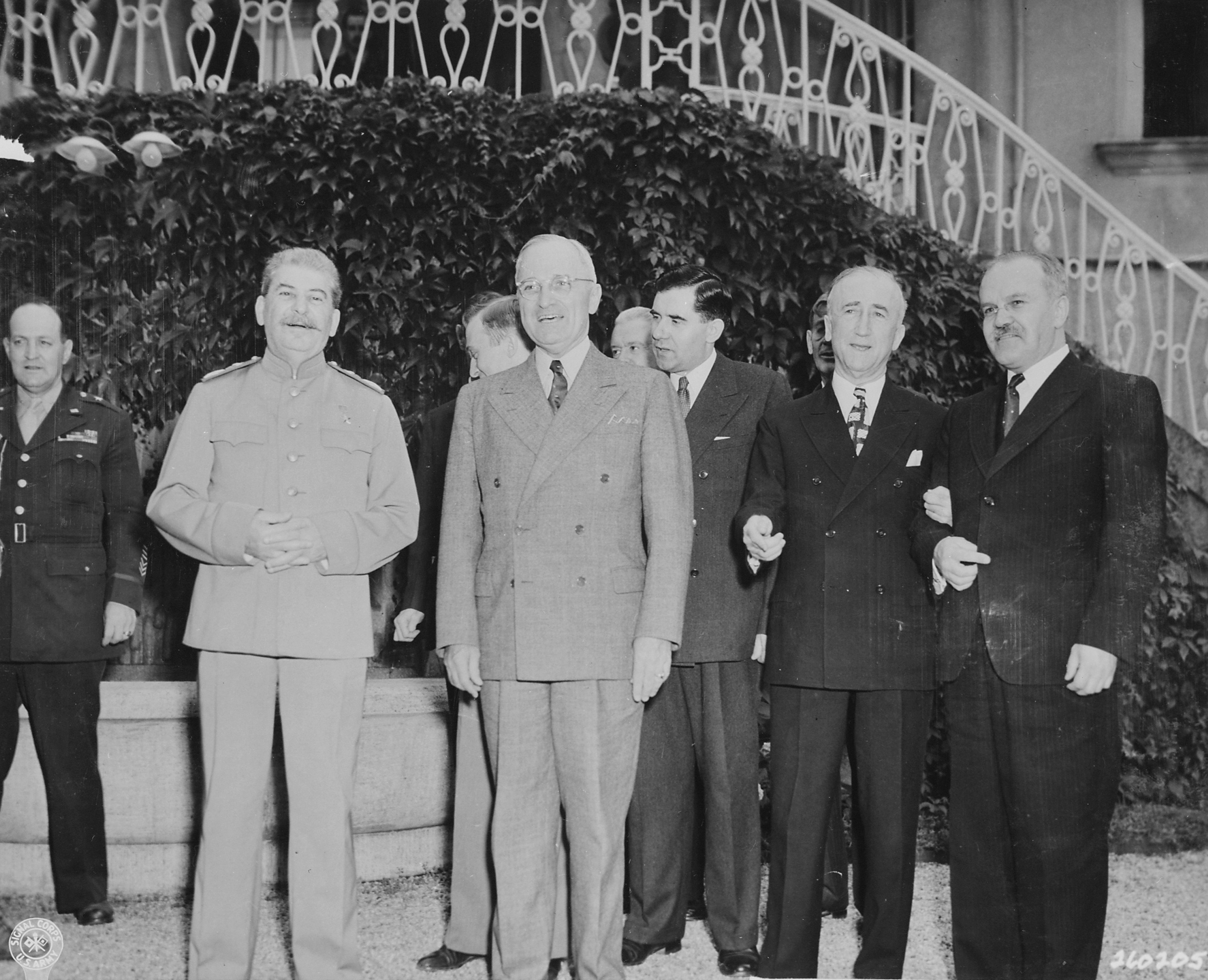 Harry Vaughan, Joseph Stalin, Harry Truman, Andrei Gromyko, Charles Ross, James Byrnes, and Vyacheslav Molotov at Stalin's residence during the Potsdam Conference, Germany, 18 Jul 1945, photo 2 of 2