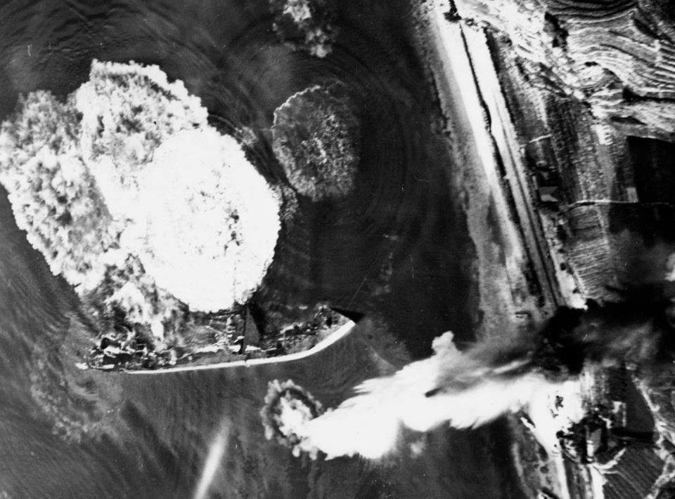 Japanese tanker under air attack, Kure, Japan, 24 Jul 1945