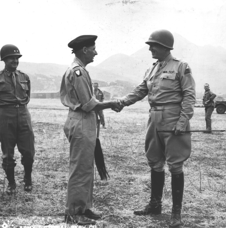 General Bernard Montgomery saying farewell to Lieutenant General George Patton at an airfield near Palermo, Sicily, Italy after Montgomery's visit, 28 Jul 1943