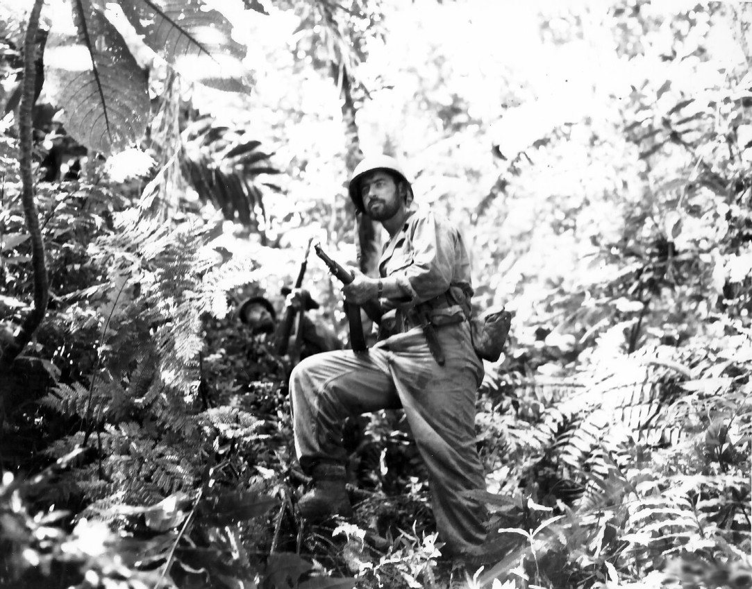 Men of Company K, 3rd Battalion, US 27th Infantry Division along the Zieta Trail, New Georgia, Solomon Islands, 12 Aug 1943