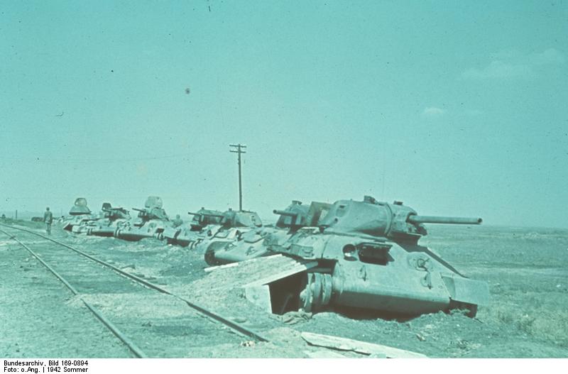 Wrecked Russian T-34 tanks on the side of a railroad, Stalingrad, Russia, 21 Jun 1942