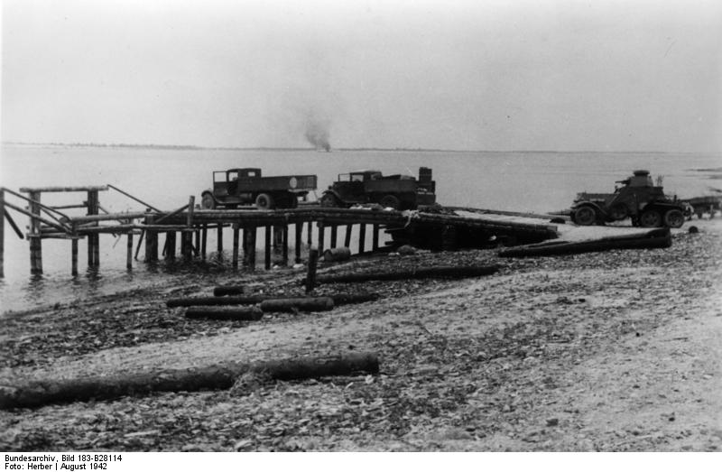 Vehicles on a ferry dock on the Volga River near Stalingrad, Russia, Aug 1942