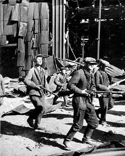 Russian factory workers with small arms in Stalingrad, Russia, 1942-1943