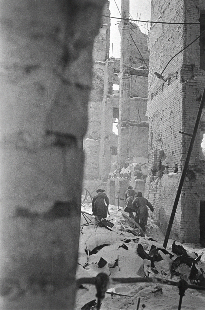 Soviet troops making their way through the ruins of Stalingrad, Russia, 1 Nov 1942