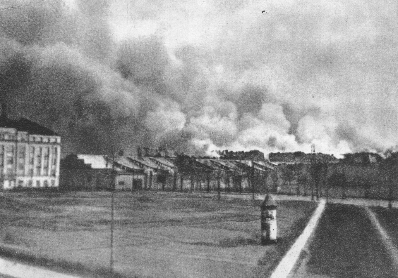 Burning buildings in the Warsaw Ghetto, seen from Zoliborz district, Poland, late Apr 1943