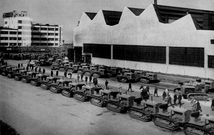 Newly built tractors outside Chelyabinsk Tractor Plant, Chelyabinsk, Russia, 1930s