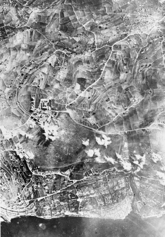 Aerial view of RAF Hal Far while under Italian attack, Malta, 1941