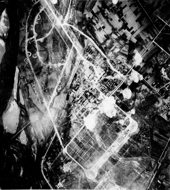 Heito Airfield under attack by aircraft of squadron VB-80 from USS Ticonderoga, southern Taiwan, 9 Jan 1945, photo 3 of 3