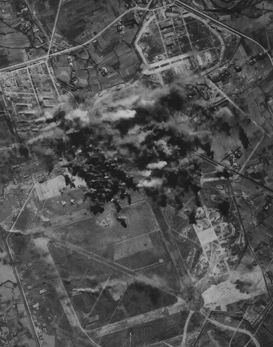 Shinchiku Airfield under B-29 attack, northern Taiwan, 17 Jan 1945, photo 3 of 3