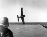 An FM-2 Wildcat in trouble immediately after take-off from USS Sable, Great Lakes, USA, May-June 1943.
