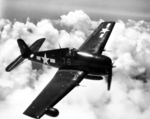 F6F-5N Hellcat nightfighter in flight, 1943-45. Based at NAS Jacksonville, Florida, USA. Note radome on starboard wing.