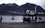 OS2U Kingfisher on a seaplane ramp in the Aleutians, Territory of Alaska, 1943-45. Note unusual National Insignia on upper right wing and Marsden matting on the ramp.