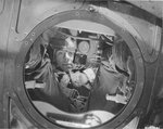 SSgt Norman A Sampson from the 427th Bomb Squadron, 303rd Bomb Group in the ball turret of a B-17 Fortress; RAF Molesworth, Cambridgeshire, England, UK, Apr 1944