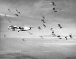 B-24 Liberator of the 464th Bomb Group bracketed by flak bursts from German anti-aircraft guns, Nov 1944.