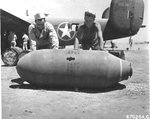 USAAF Ordinancemen with the 514th Bomb Squadron preparing bombs at Soluch Airfield, Benghazi, Libya, mid-1943. B-24D Liberator “Wash’s Tub” in the background was one of the bombers on the Ploesti Raid of Aug 1 1943.