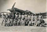 Members of the American Volunteer Group 3rd Pursuit Squadron line up in front of one of their P-40C Tomahawk fighters, 1941
