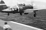 USAAF pilot Lt Eubanks Barnhill flies his P-47D Thunderbolt off the deck of Escort Carrier USS Manila Bay to ward off an aerial attack from four D3A Aichi “Val” dive bombers during refueling operations east of Saipan, Jun 23 1944. Photo 2 of 2