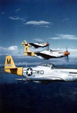 P-51D Mustangs of the 4th Fighter Squadron in flight, Italy, 1944.
