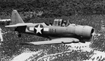 An SNJ-3 Texan of Marine Air Group 11 flying over Espiritu Santo, New Hebrides, Oct 1943. Note the lack of a painted border around the National Insignia.