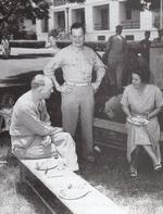 Marine Lt Gen Lem Shepherd (seated) with Col Chesty Puller and Mrs. Virginia Puller at a 4th of July barbecue at the Marine barracks, TH Hawaii, July 4 1950.