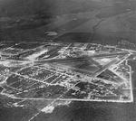 Aerial view of Marine Corps Air Station Ewa, Oahu, Hawaii, showing its final configuration with four runways and numerous reinforced aircraft revetments, 1945.