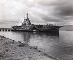 HMS Victorious moored at Berth F-10, Ford Island, Pearl Harbor, Oahu, Hawaii, Mar 4, 1943. The carrier was undergoing modifications for service during the period she was on loan to the US Fleet. Photo 1 of 2.