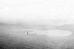 Japanese cruiser Kashii sinking with only the bow showing after being attacked by United States carrier aircraft off the coast of French Indochina (Vietnam) north of Qui Nhon, Jan 12, 1945. Photo 7 of 9