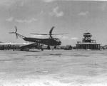 Sikorsky R-4B Helicopter delivering spare aircraft parts to the B-29 base at North Field, Tinian, Mariana Islands, 11 Apr 1945.