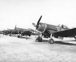 Line of F4U-1A Corsairs of Marine Squadron VMA-21 at Orote Field, Guam, Marianas, 1944. Note the nose art, which was rare on Navy or Marine aircraft but (obviously) not unheard of.