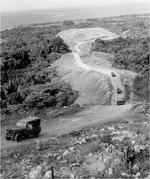US Army Jeeps driving up Wright Road toward the area of the Japanese Gifu strongpoint on Guadalcanal, Solomon Islands, 1942.
