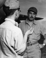 USMC 2Lt Gordon Growden, combat correspondent, interviews Japanese POW 2Lt Minoru Wada prior to a bombing mission against the prisoner’s former headquarters, Zamboanga, Mindanao, Aug 9, 1945