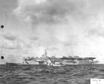 Escort Carrier USS Guadalcanal off the African coast, 7 Jun 1944. The captured U-505 is in the foreground with a US Navy whaleboat alongside.