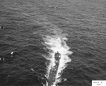 Abandoned by her crew but with engines still running, German Type IXC submarine U-505 circles at 7 knots before US boarding parties complete the capture off the West African coast, 4 Jun 1944.